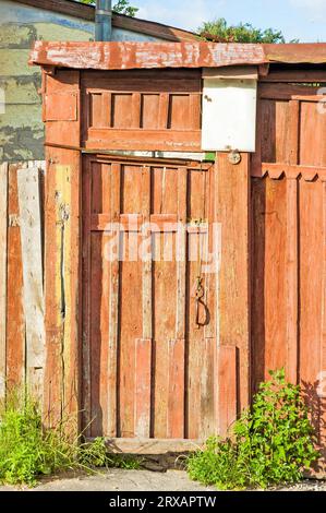 Old wooden ukrainian door in the Kiev suburb Stock Photo