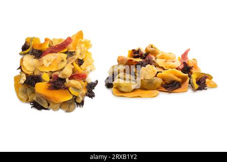 Mix of dried exotic fruit, mangos,slices of pineapples, passion fruit, papaya. Vegetarian dessert. Stock Photo