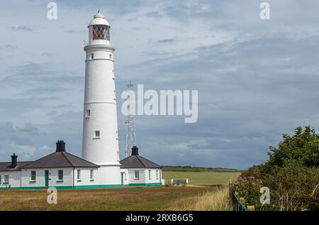 Nash Point Lighthouse and Accommodation on the Nash Point beach area Vale of Glamorgan Stock Photo