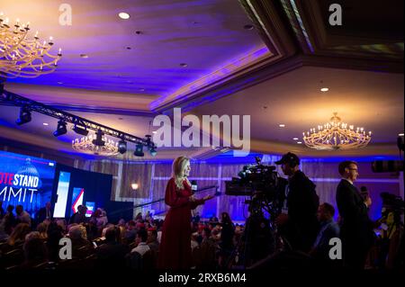 Journalists work their stand ups on the back riser during the Pray Vote Stand Summit at the Omni Shoreham Hotel in Washington, DC, Friday, September 15, 2023. Credit: Rod Lamkey/CNP /MediaPunch Stock Photo
