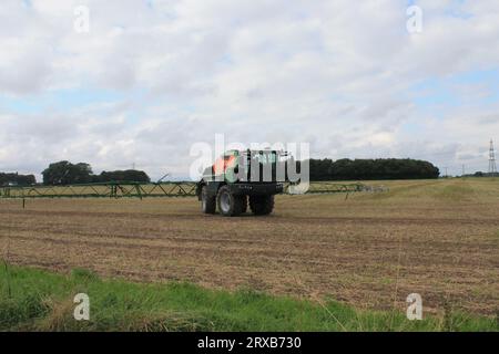 Birkin North Yorkshire UK August 26th 2023 Farmer spraying ploughed field with chemical substance in late summer Stock Photo