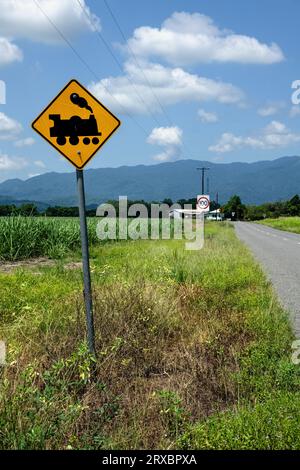 Sign warning of sugar cane trains on the 'Cane Cutters Trail', near Mena Creek, Queensland, Australia Stock Photo
