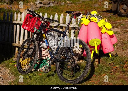 Bicycle and Lobster Floats   Monhegan Island, Maine, USA Stock Photo