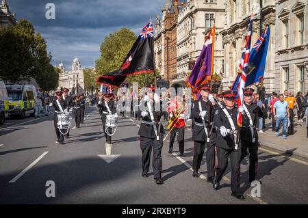 Members of an Irish protestant loyalist paramilitary Ulster Volunteer Force (UVF) band march past the Cenotaph war memorial in Whitehall, London. Prid Stock Photo