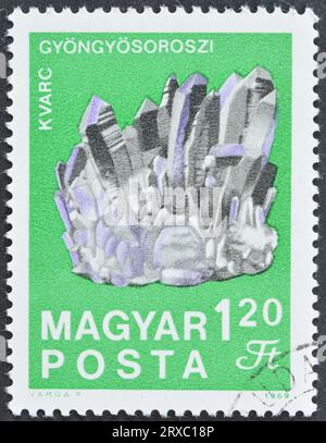 Cancelled postage stamp printed by Hungary, that shows Quartz crystals from Gyöngyösoroszi, circa 1969. Stock Photo