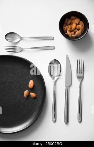 Cutlery set - tea spoon, table spoon, dessert fork, table fork and table knife Stock Photo