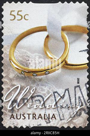 Wedding rings on australian postage stamp Stock Photo