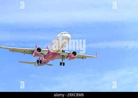 Barcelona, Spain; April 10, 2023: Airbus A320 plane of the Wizz Air company, landing at the Josep Tarradellas Barcelona-el Prat airport Stock Photo