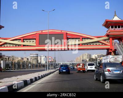 Cairo, Egypt, September 17 2023: Shinzo Abe axis patrol highway with a pedestrian bridge finished in traditional Japanese architectural style, the tra Stock Photo