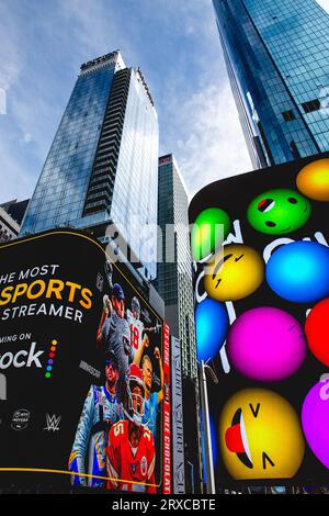 TIMES SQUARE, NEW YORK, USA, - SEPTEMBER 15, 2023. Low angle view of new York city skyscrapers and colourful electronic billboards in Times Square New Stock Photo