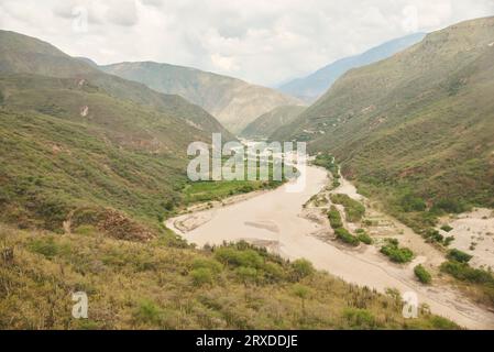 Andean scenery, river flowing through the mountains in the Chicamocha Canyon, a popular tourist destination in Santander, Colombia. Stock Photo