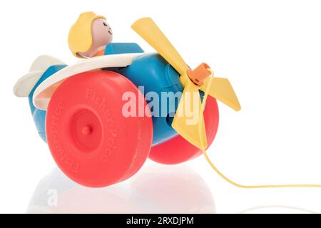 Winneconne, WI - 23 September 2023:  A package of a vintage Fisher Price pull airplane on an isolated background Stock Photo