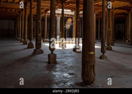 Ancient wooden columns of the medieval Juma mosque. Khiva, Uzbekistan Stock Photo