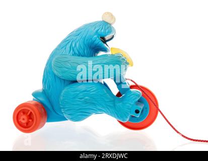 Winneconne, WI - 23 September 2023:  A package of a vintage cookie monster pull toy on an isolated background Stock Photo