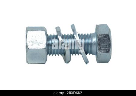 Full thread hexagon bolt and internal screw, flat nut washer and spring washer coated with a protective layer of zinc isolated on white background Stock Photo