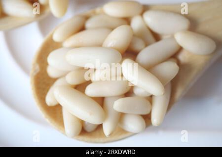 Healthy pine nuts isolated on white background. Stock Photo