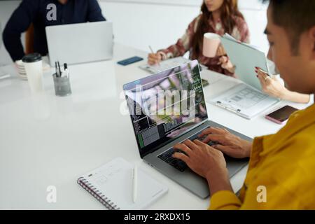 Programming code on laptop screen of software developer Stock Photo