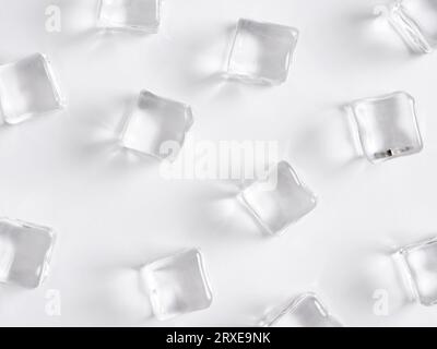 Transparent ice cubes on white background. Stock Photo