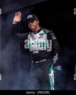 NASCAR Busch Series driver Brad Baker (37) slides backwards out of Turn ...