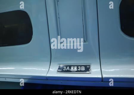 interior inside an executive train. hook. electric plugs. drinking stand. Seat Number. Stock Photo