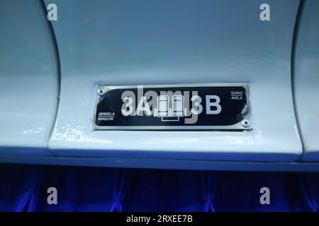 interior inside an executive train. hook. electric plugs. drinking stand. Seat Number. Stock Photo