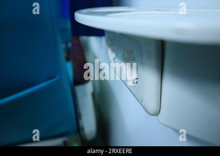 interior inside an executive train. electric plugs. drinking stand. Stock Photo