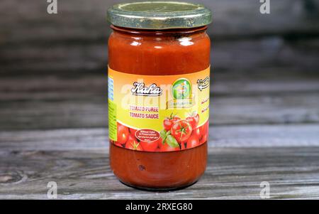 Cairo, Egypt, September 11 2023: Kaha Qaha tomato puree sauce, tomatoes paste, Kaha company for preserved foods is a subsidiary of the holding company Stock Photo