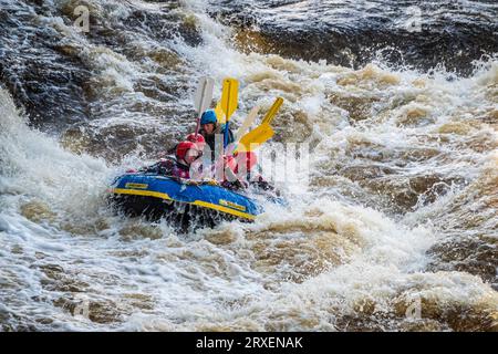 Whitewater rafting on the river Dee rapids at Town Falls in llangollen, North Wales. Stock Photo