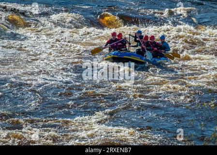 Whitewater rafting on the river Dee rapids at Town Falls in llangollen, North Wales. Stock Photo
