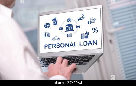 Personal loan concept shown on a laptop used by a man Stock Photo