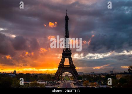 Dramatic sunrise behind the Eiffel Tower. Spring morning in Paris, France Stock Photo