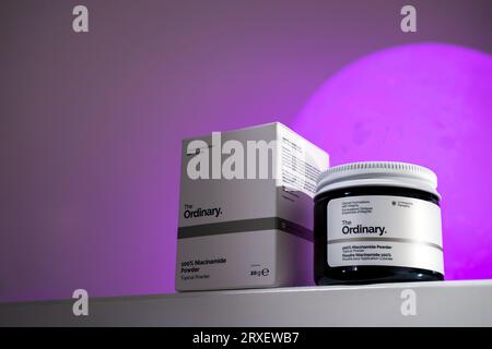 Strasbourg, France - September 2023: The Ordinary skincare brand by Deciem. Niacinamide Powder packaging against purple moon. Clean minimalist high ke Stock Photo