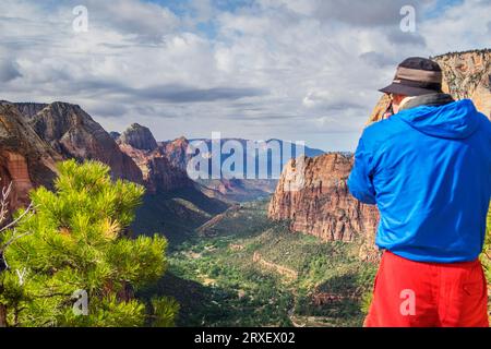 Man photographing Zion Canyon, Utah, USA Stock Photo