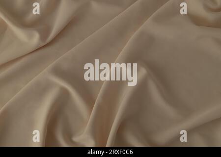 Modern silk fabric background. Minimal concept. Neutral design. Flat lay, top of view. Stock Photo