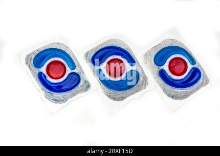 Dishwasher detergent tablets red and blue color on powder. Choice concept. Copy space. High quality photo Stock Photo