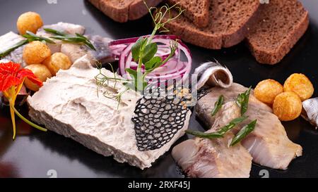 Forshmak snack on a plate with toast Stock Photo - Alamy
