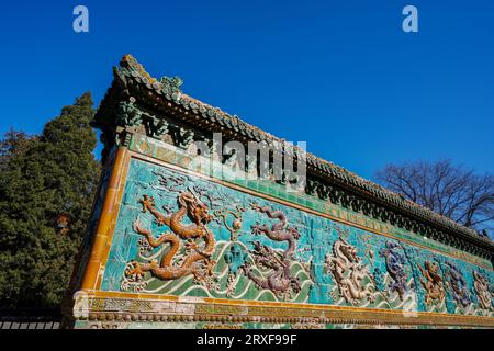 Beijing China, February 20, 2023: Nine-Dragon Wall Architecture Landscape of Beihai Park in Beijing. Stock Photo