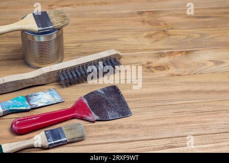 Old and dusty tools. Set of home tools for repair works on wooden background. Top view. Copy space Stock Photo