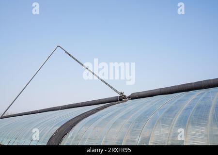 Electric roller shutter for greenhouse Stock Photo