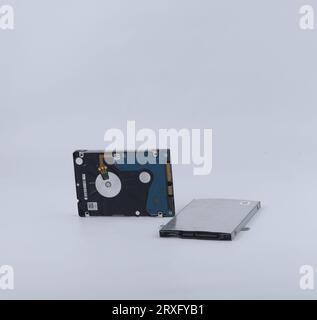 Two broken laptop hard drives isolated on a white background Stock Photo