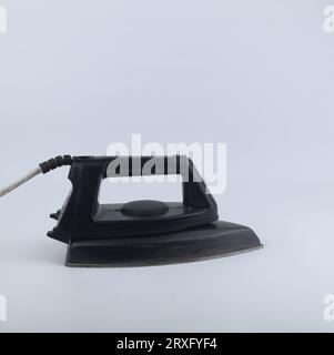 electric iron isolated on a white background Stock Photo