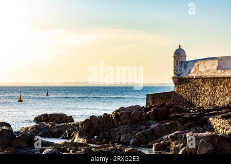 Saint Mary fort on the seafront of the city of Salvador in Bahia during sunset, Brasil Stock Photo