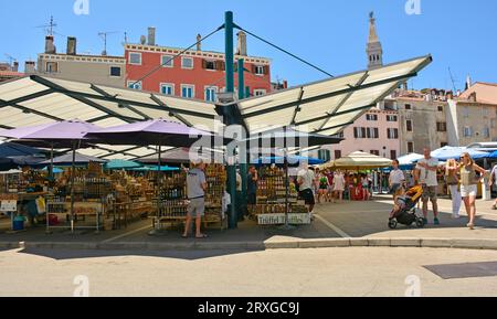 Rovinj, Croatia - July 9th 2023. A small outdoor market in Rovinj old town in Istria, Croatia. It sells fruit, vegetables and souvenirs such as honey Stock Photo
