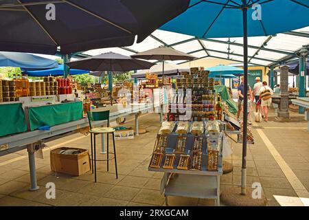 Rovinj, Croatia - July 9th 2023. A small outdoor market in Rovinj old town in Istria, Croatia. It sells fruit, vegetables and souvenirs such as honey Stock Photo