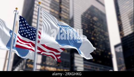 New York, US, Aug. 1 2023: Golman Sachs bank and the United States flags waving in a financial district. Illustrative editorial 3d illustration. Finan Stock Photo