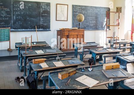 1920s classroom of country school at Domaine du Fourneau Saint-Michel, open-air museum of Walloon rural life at Saint-Hubert, Ardennes, Belgium Stock Photo