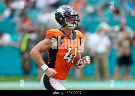 Denver Broncos linebacker Drew Sanders (41) makes an interceptionagainst  the Los Angeles Rams of an NFL football game Saturday, Aug 26, 2023, in  Denver. (AP Photo/Bart Young Stock Photo - Alamy