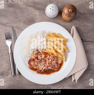 Typical lunch in Brazil - fries, rice, pasta, beef and salad Stock Photo -  Alamy