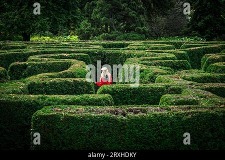 Woman in maze, VanDusen Gardens, Vancouver, British Columbia, Canada Stock Photo