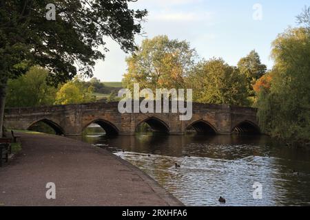 5 arch 13th century arched bridge spanning the river wye in Bakewell Derbyshire Peak District National park England UK, Historic listed structure Stock Photo